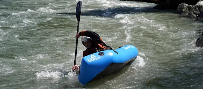 Wildwasserkurs mit dem Packraft